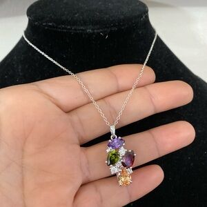 Nataliya V Collister’s rhinestone and crystal cluster pendant